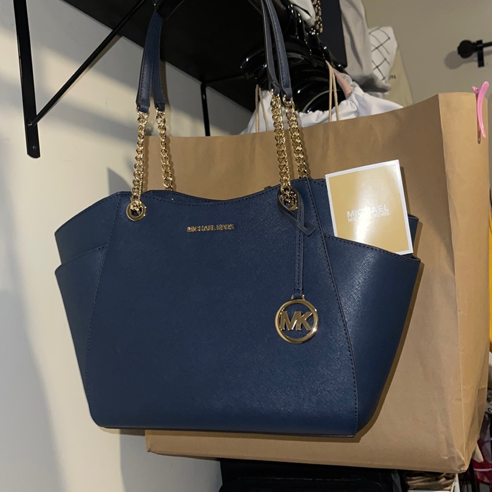 NWOT Michael Kors Saffrano navy blue with gold colored hardware.